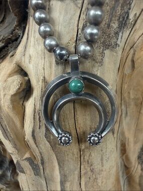Collectible “BELL TRADING POST” necklace.